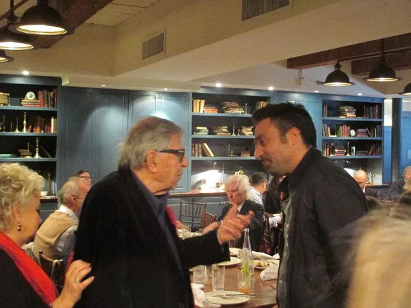 Hungry Hearts director Saverio Costanzo in the grip of Wondrous Boccaccio director Paolo Taviani 